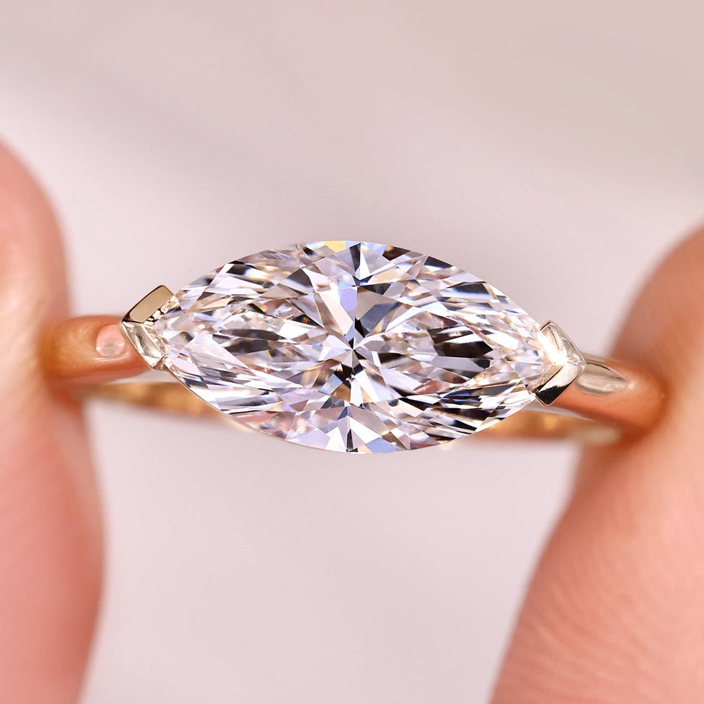 Marquise diamond engagement ring with solitaire engagement ring.