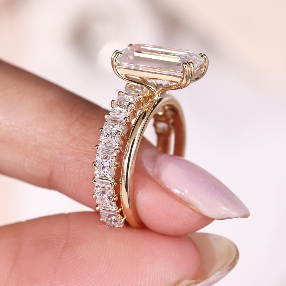 Princess cut moissanite band created to complement the emerald center ring.