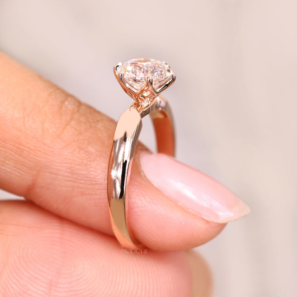 Portuguese cut ring with tulip basket setting.

