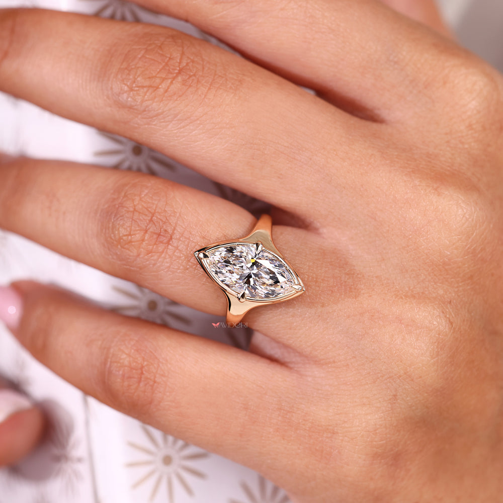Bezel type prong settings for a secure diamond hold.