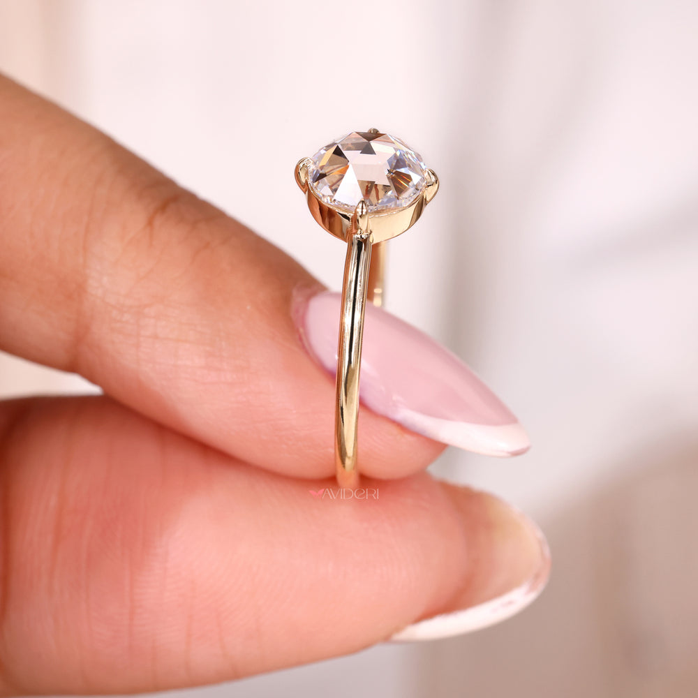 Custom yellow gold engagement ring crafted for a unique love story.
