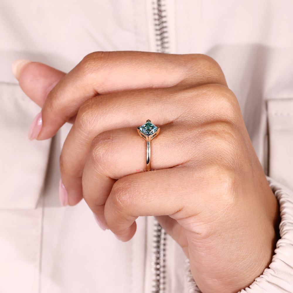 Handmade princess moissanite ring cyan blue.
