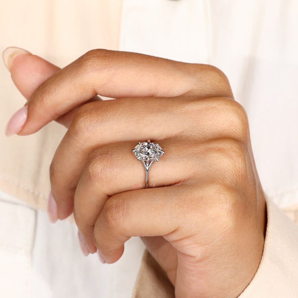 Six claw prong oval diamond ring handmade.
