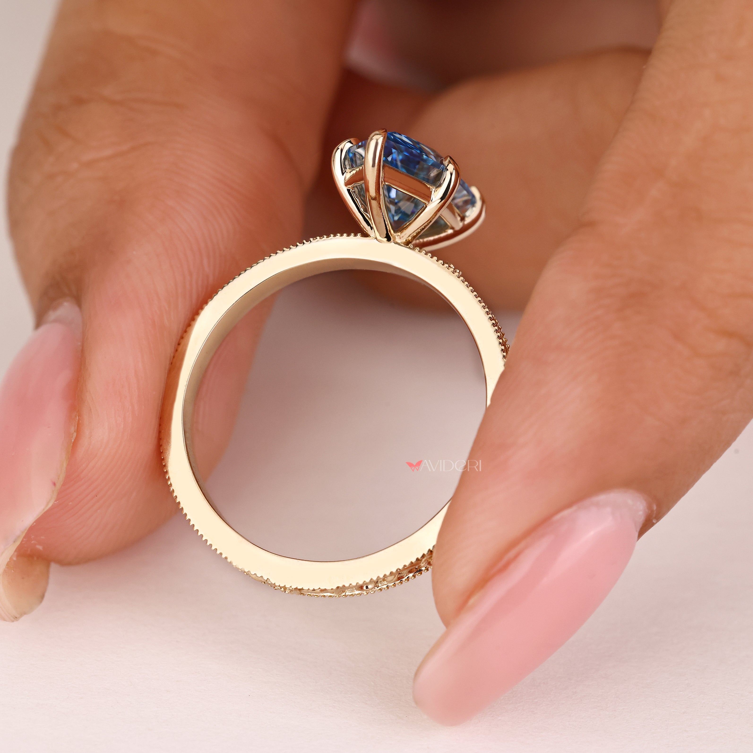 Blue center lab grown Dutch marquise diamond engagement ring
