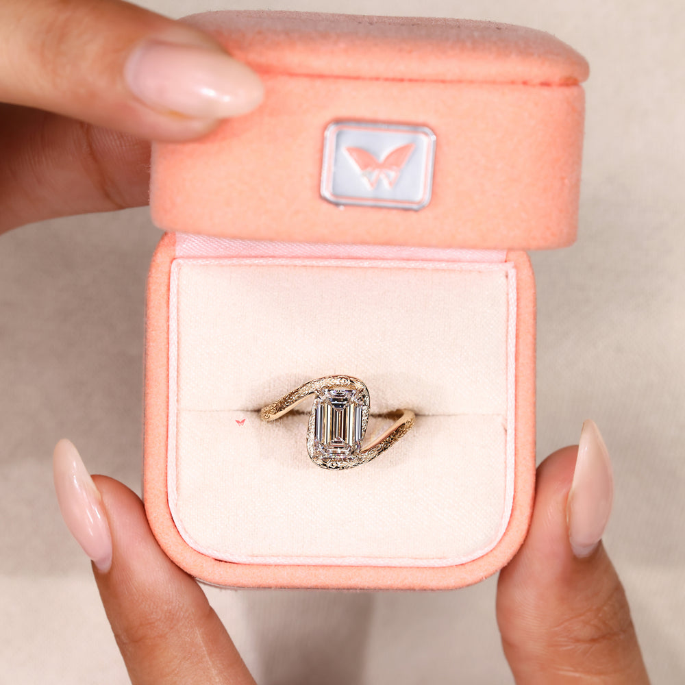 Solitaire Style Emerald Cut Diamond Ring with Engraved Shank