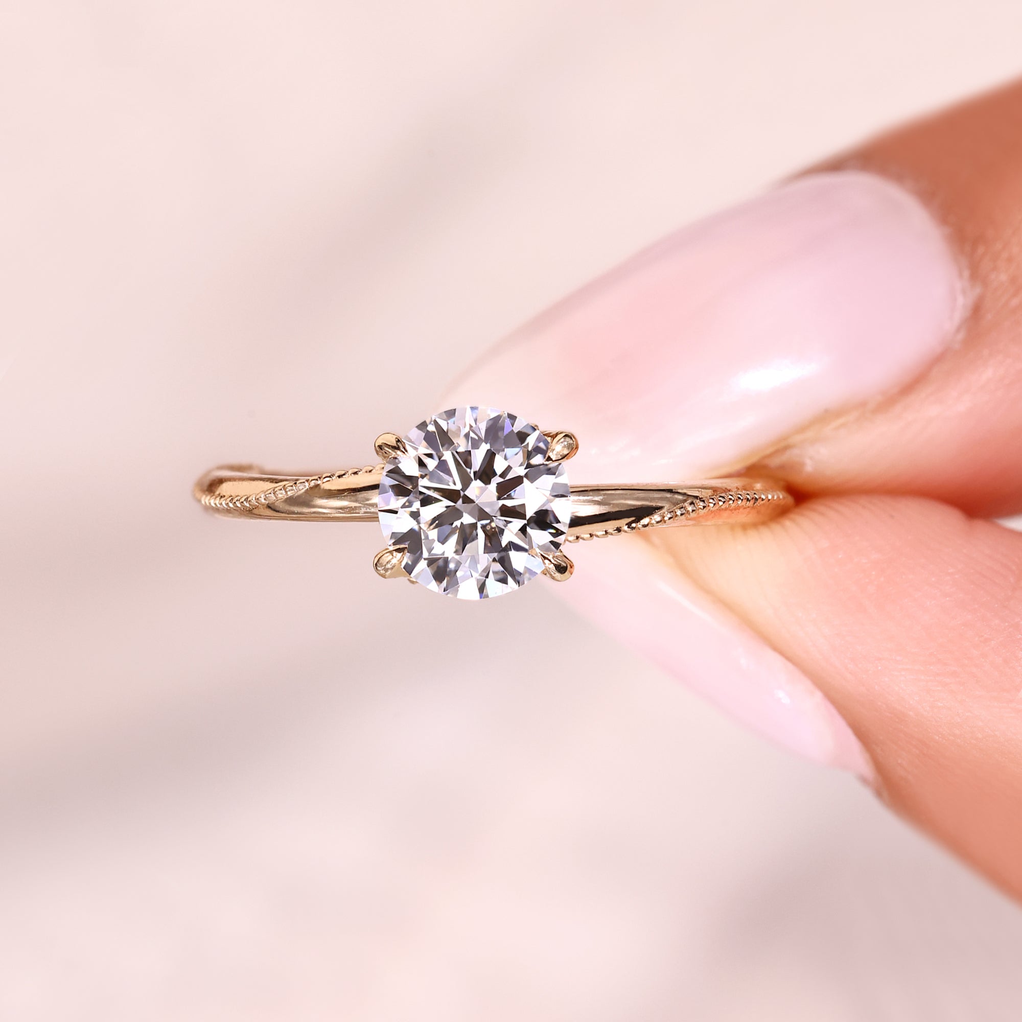 Handmade lab grown round cut diamond ring with milgrain.
