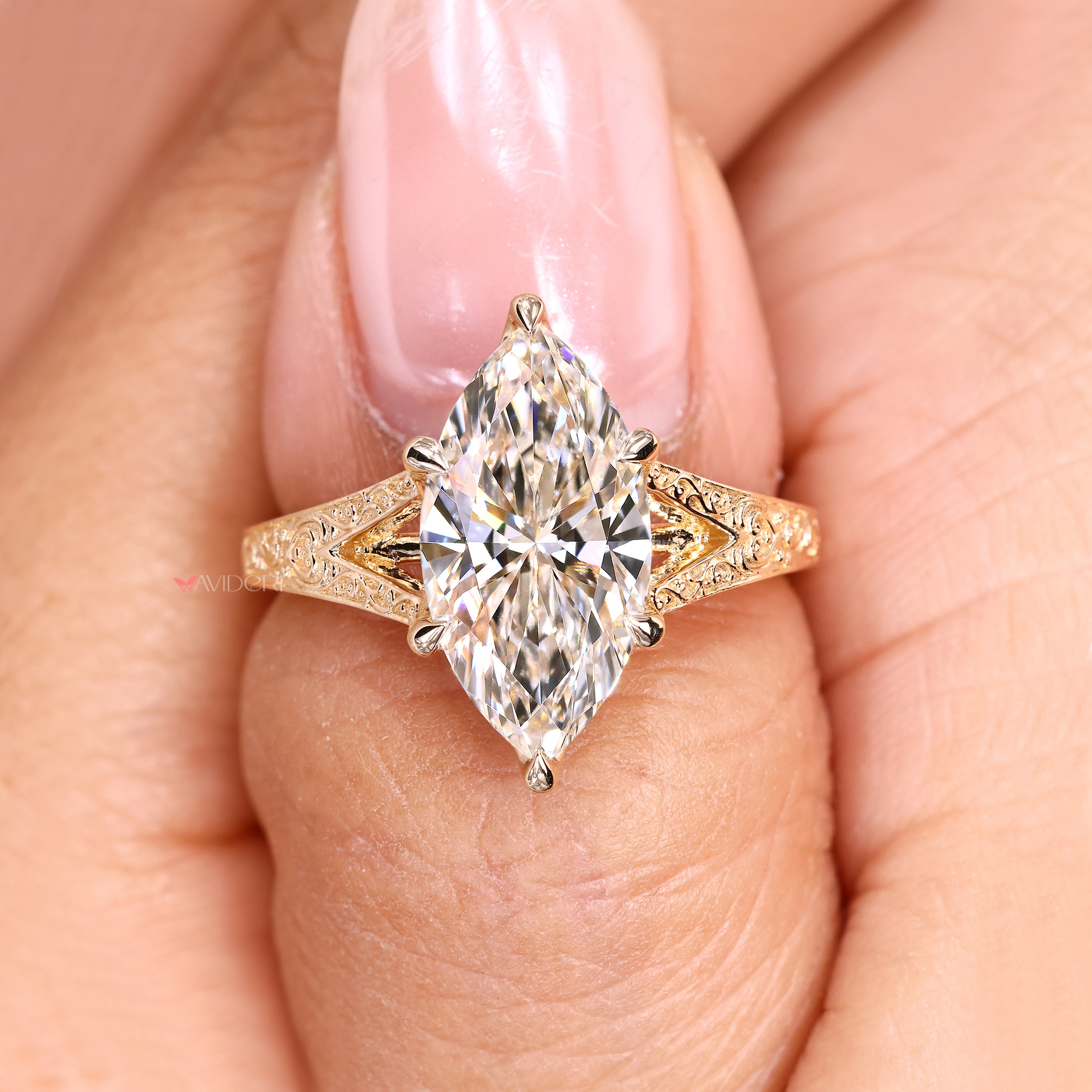 Handmade marquise ring with six claw prong.
