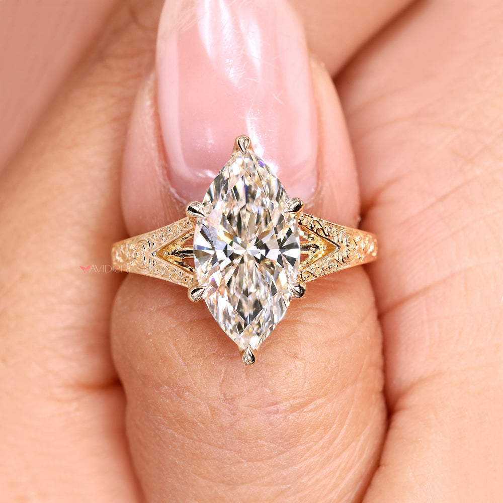 Handmade marquise ring with six claw prong.
