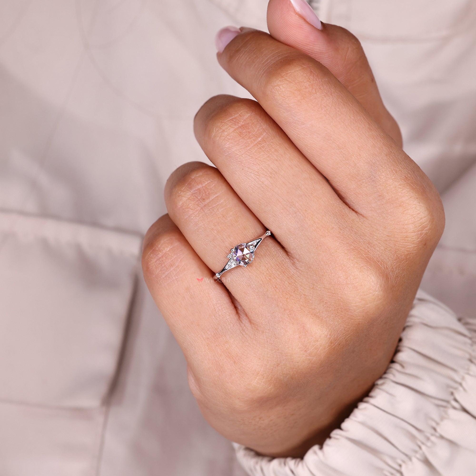 Handmade five stone diamond ring with style.
