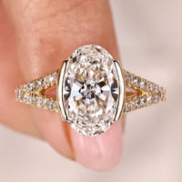 Oval Diamond Engagement Ring In Half Bezel Setting