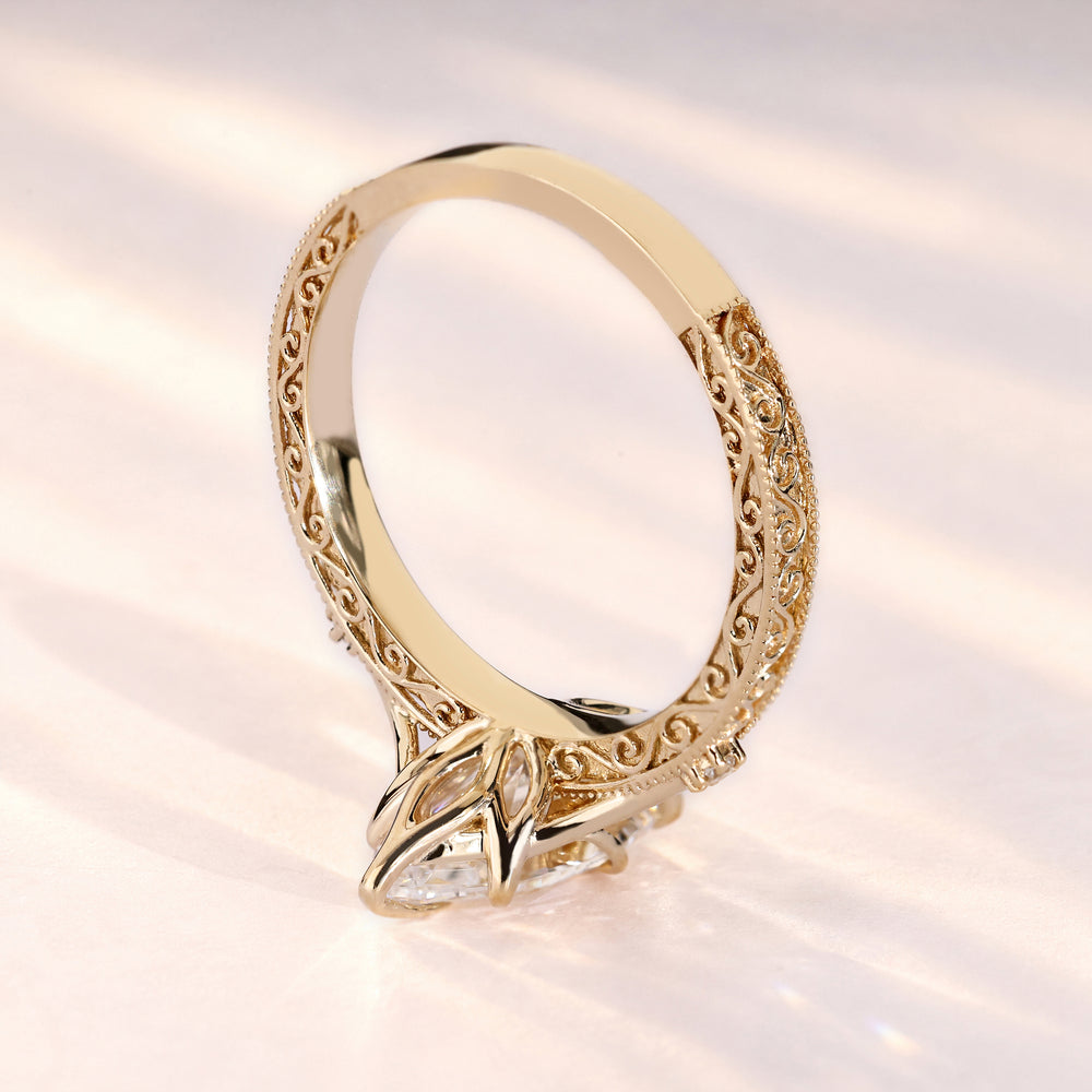 Handmade marquise ring with tulip basket setting.
