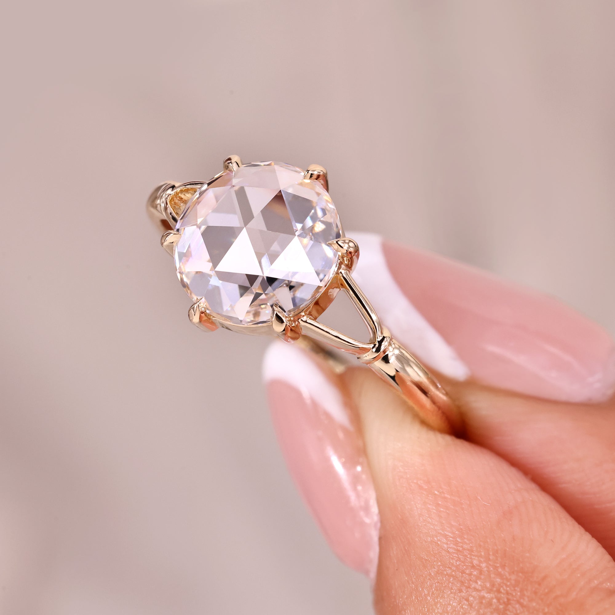 Split shank diamond ring in six claw prong.