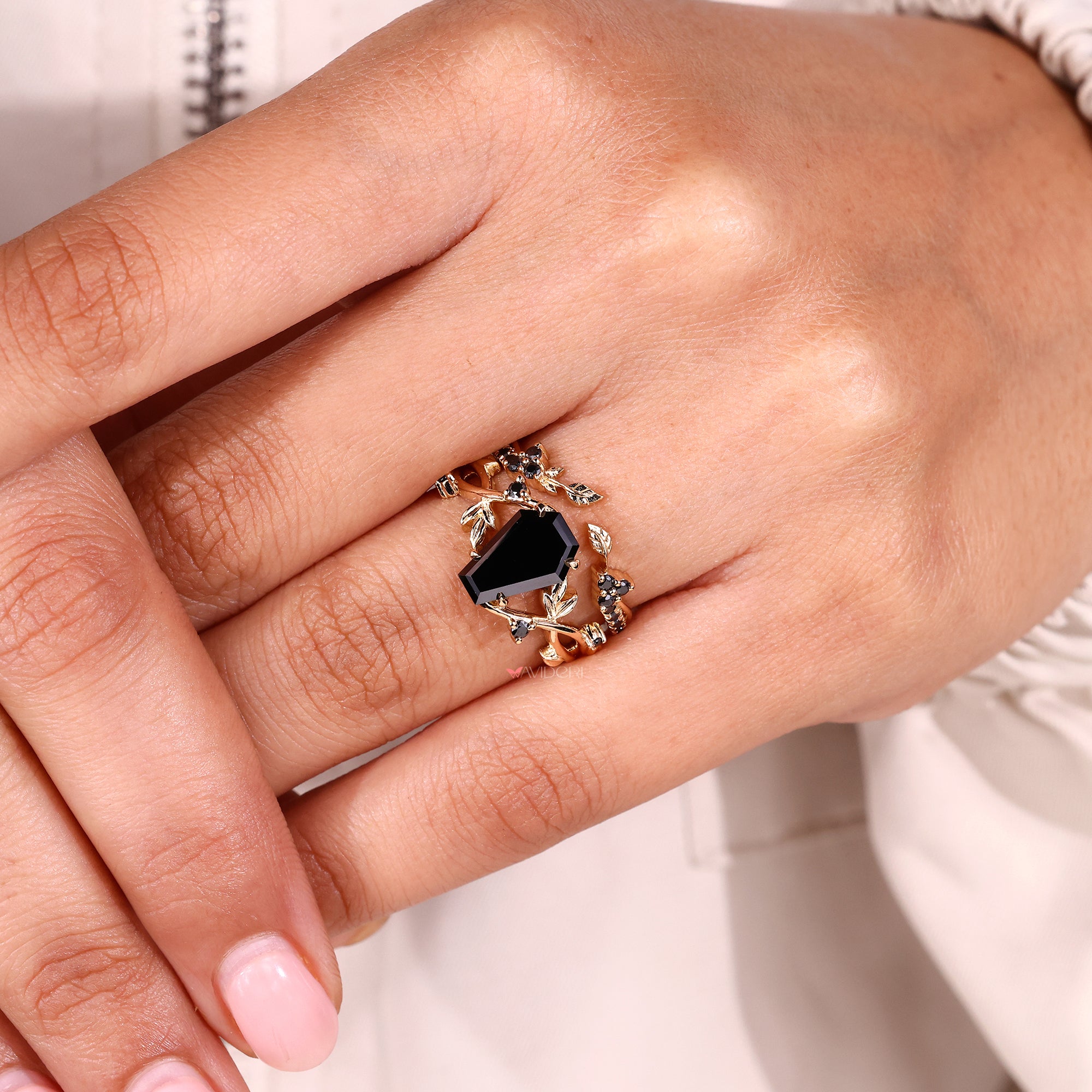 Round cut wedding band with handmade design and smooth gold finish.