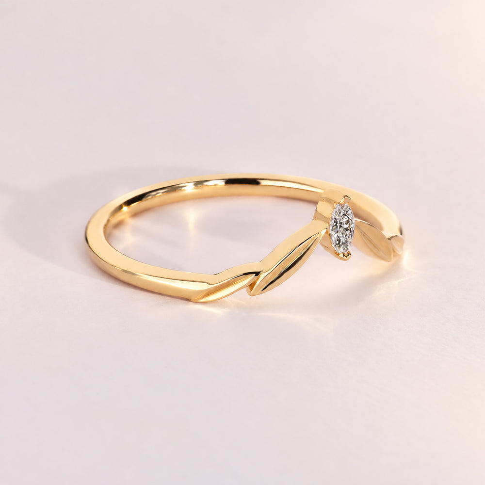 Handmade curved wedding band with marquise diamonds.
