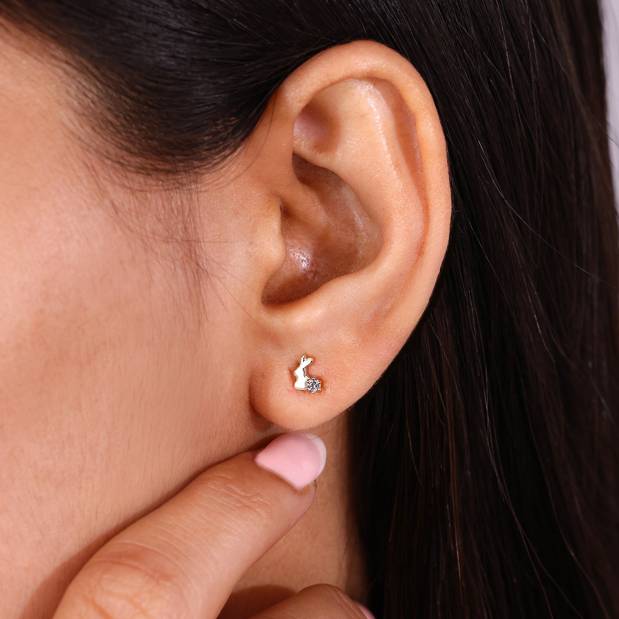 Handmade jewelry yellow gold rabbit studs.
