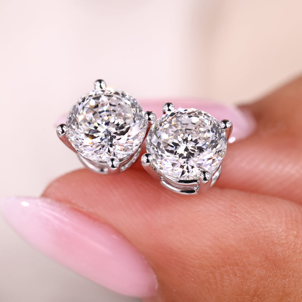 Four prong setting Portuguese cut stud earrings.