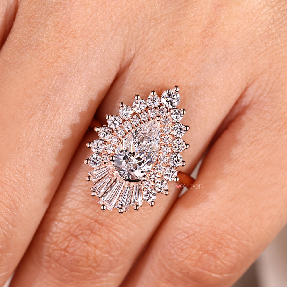 Vintage inspired pear cut diamond ring with round halo.