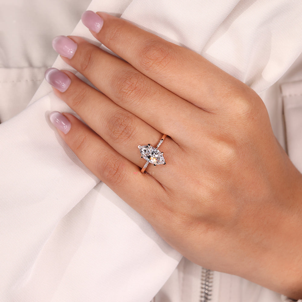 Rose gold engagement ring combines warm tone with classic style.
