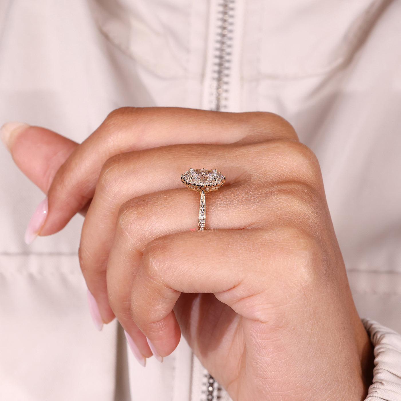 Diamond ring with four claw prong setting style.
