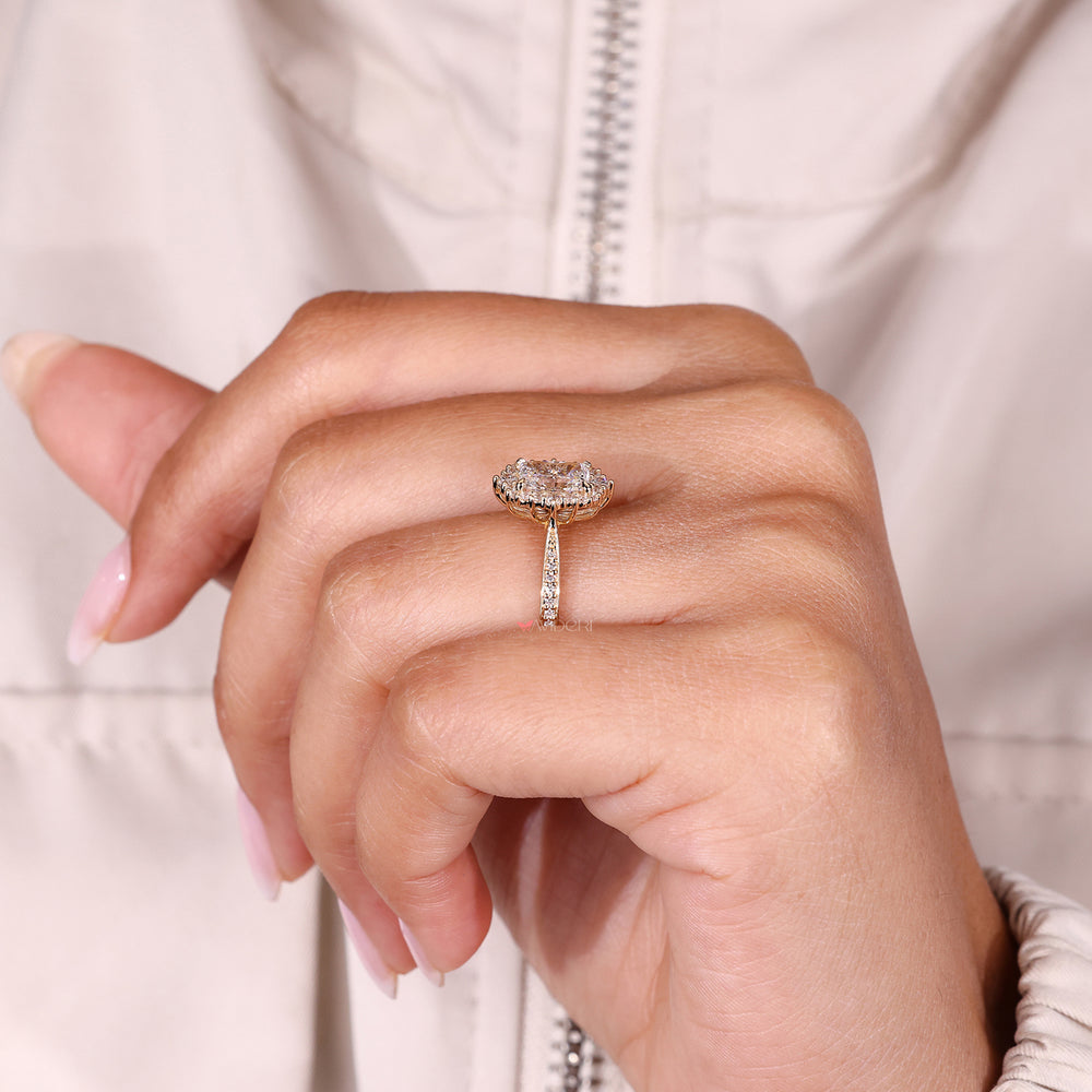 Diamond ring with four claw prong setting style.
