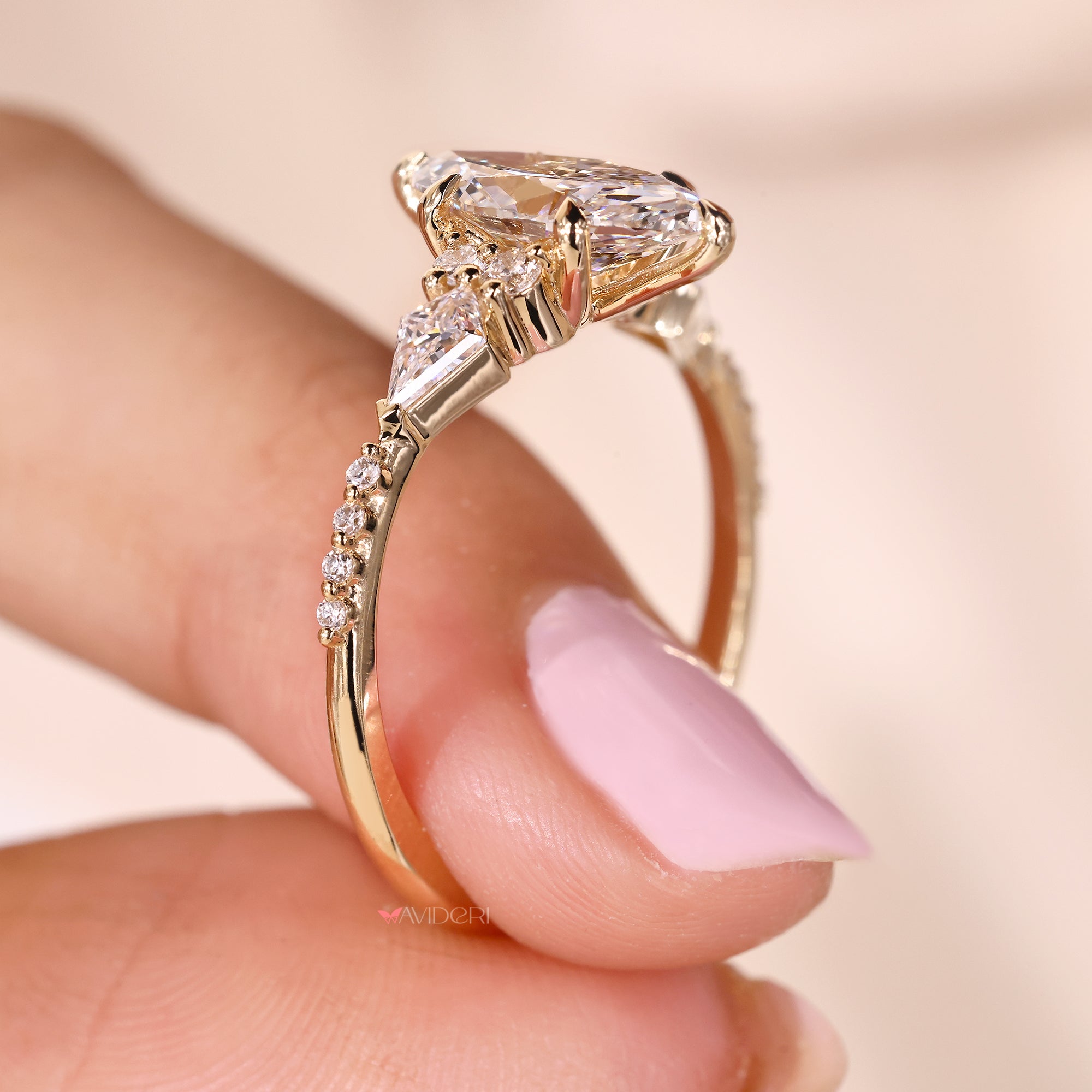 Tapered shank marquise ring in Muse setting.