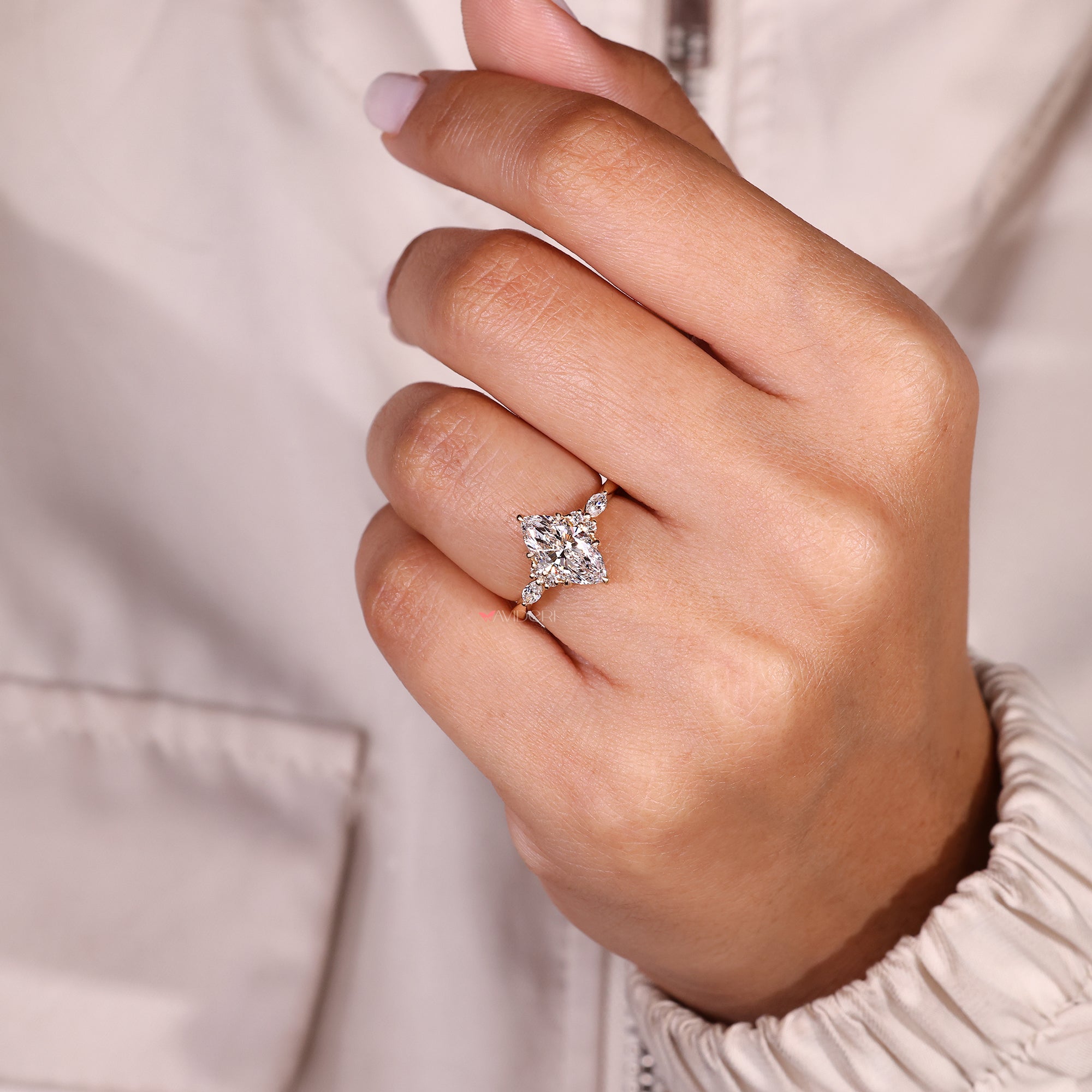 Lab grown marquise diamond ring with muse setting.
