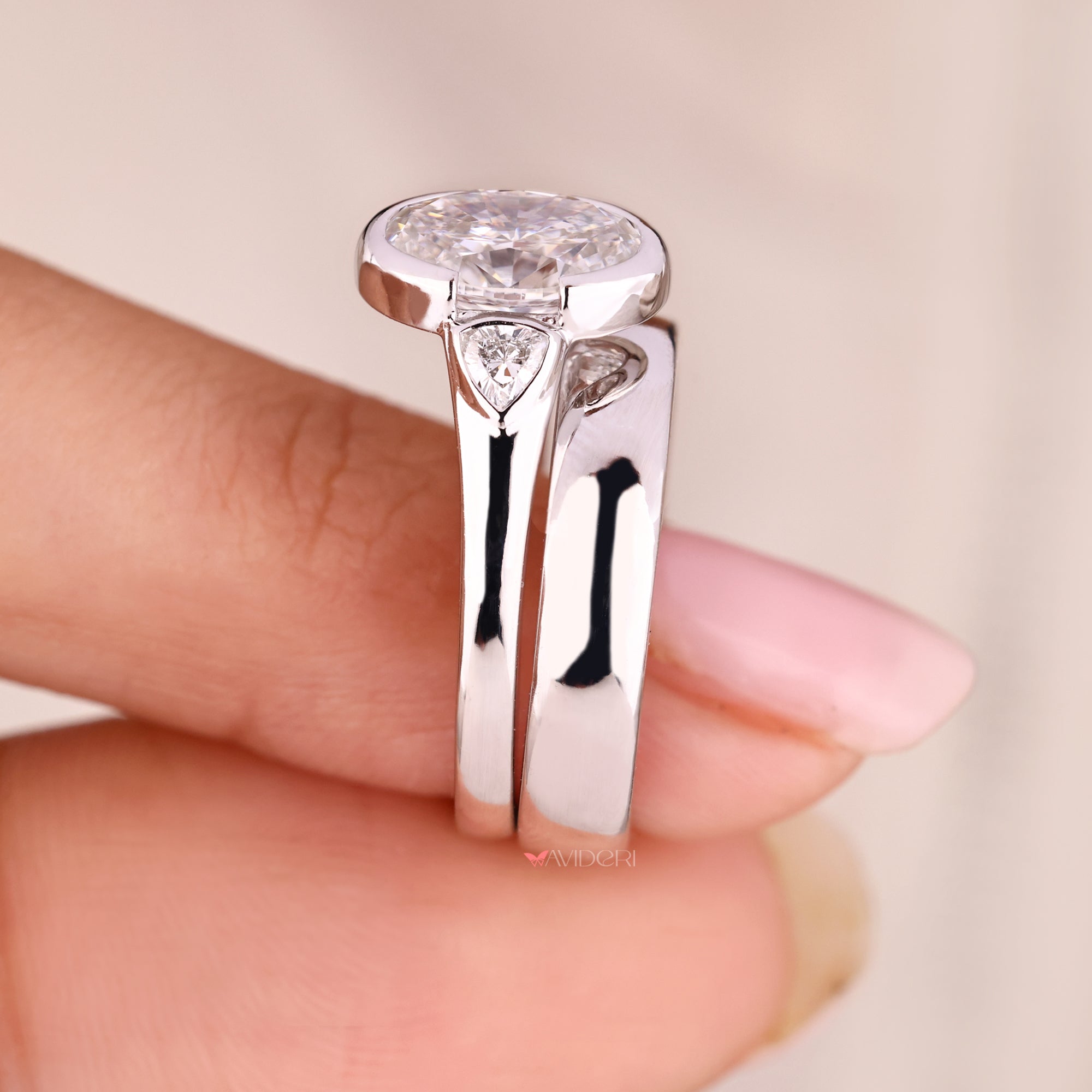 Simple white gold wedding band with lab grown diamonds.