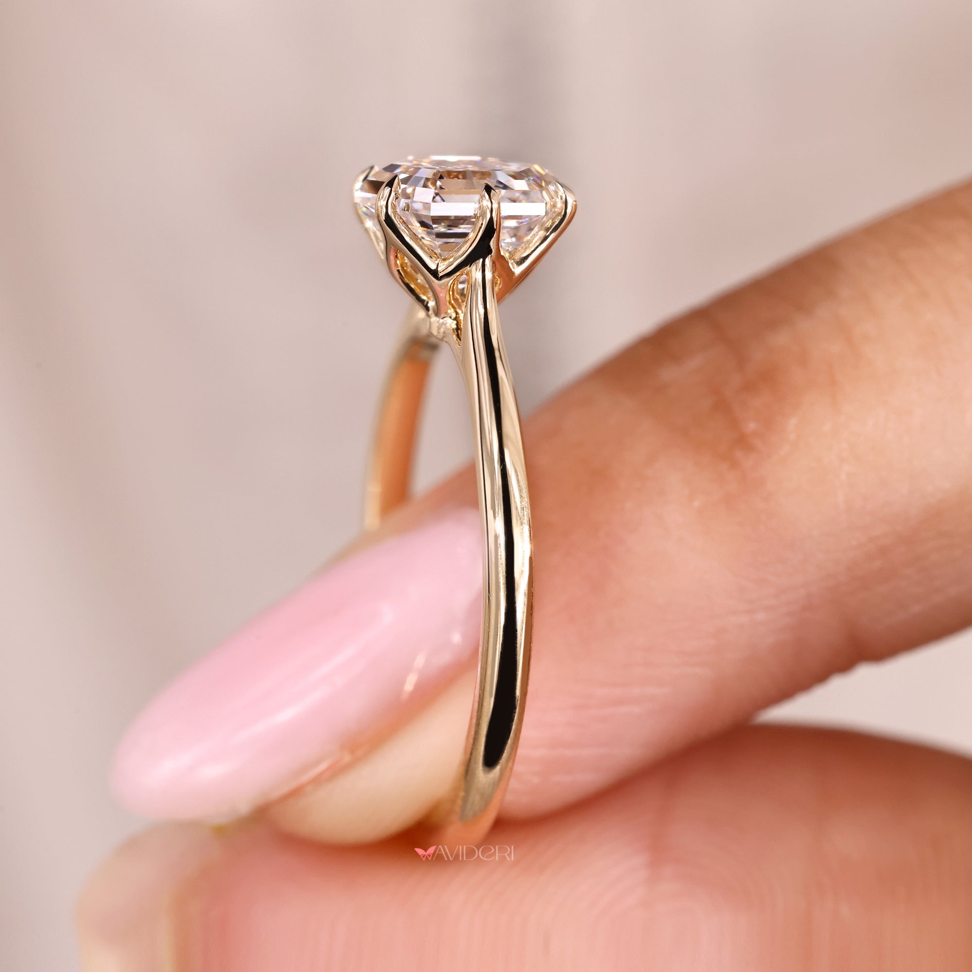 Tapered shank ring and cathedral setting engagement ring.