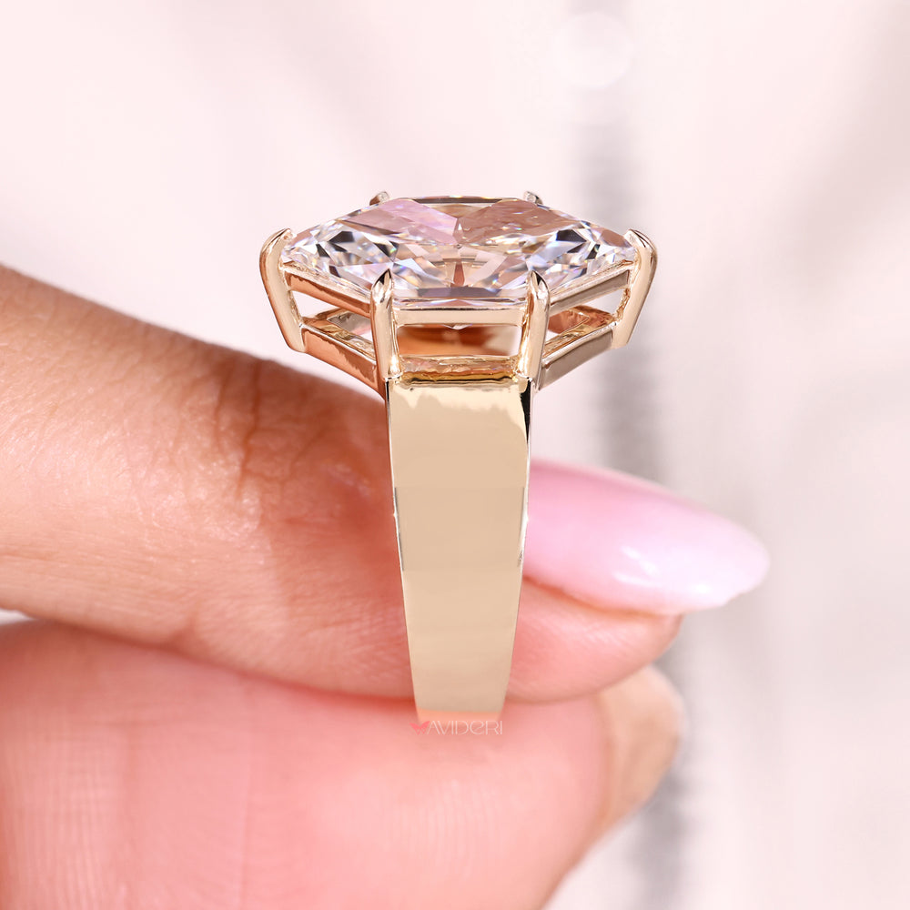 Tapered shank marquise diamond ring design.