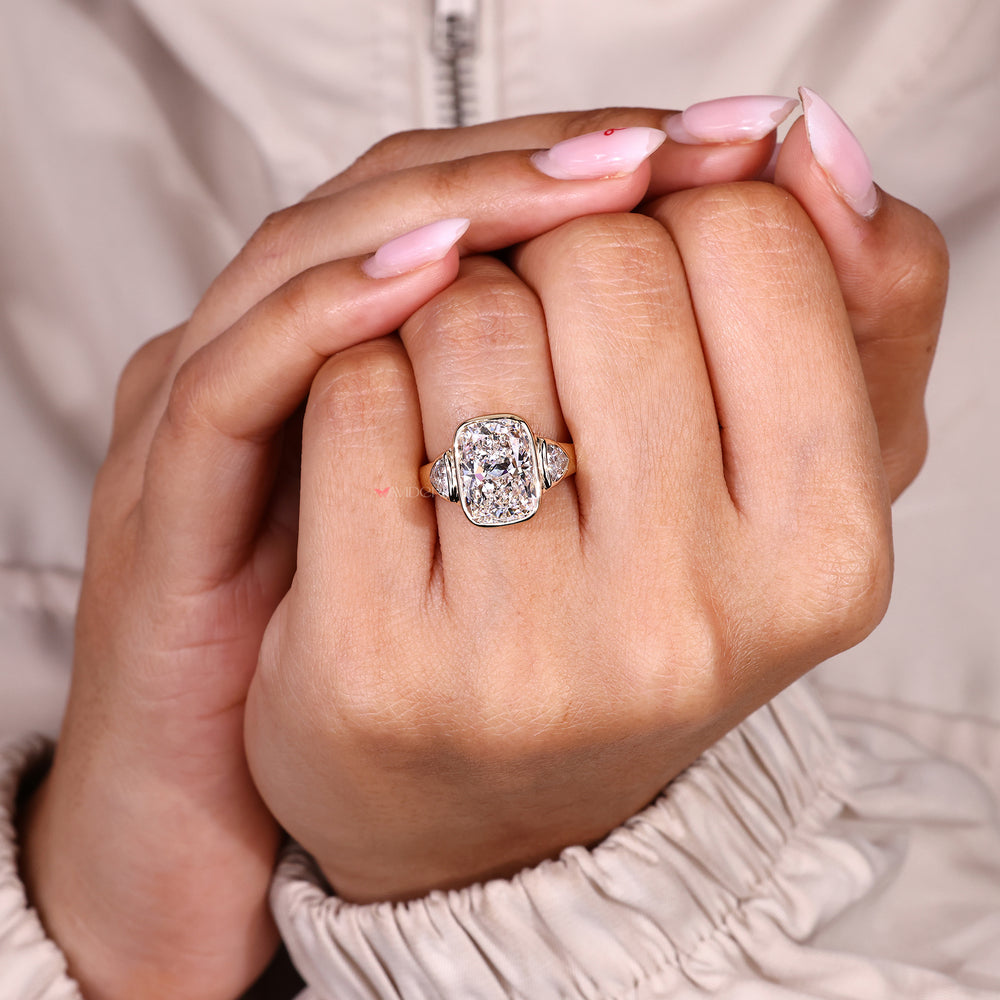 IGI certified cushion cut engagement ring with side stones.