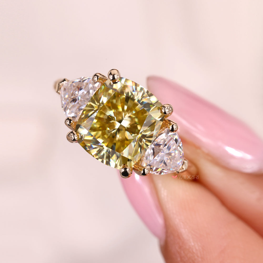 Cushion cut moissanite ring with elegant trillion sides.
