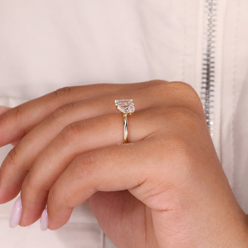 IGI certified toi et moi ring with radiant diamonds for guaranteed quality.
