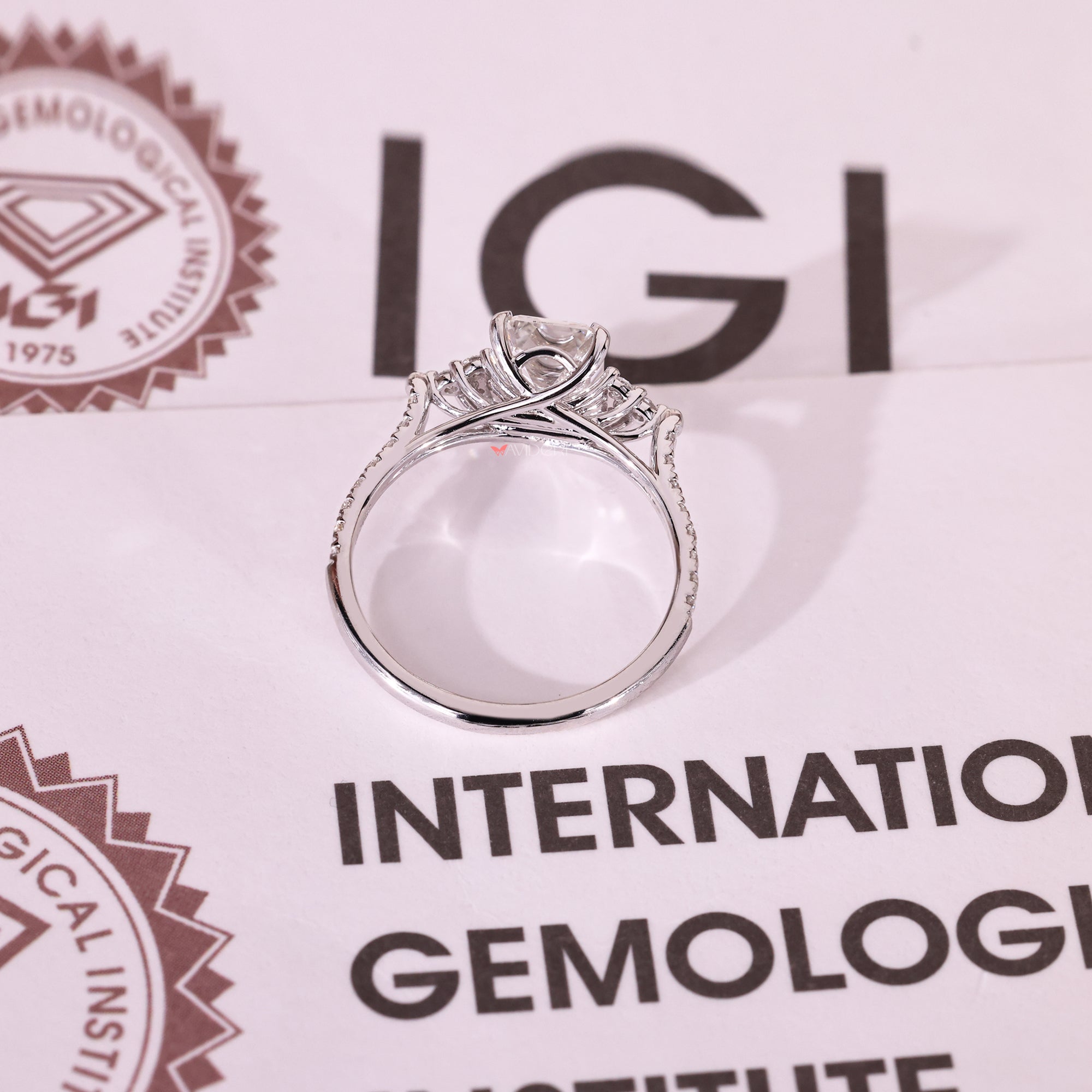 IGI certified emerald cut diamond engagement ring.
