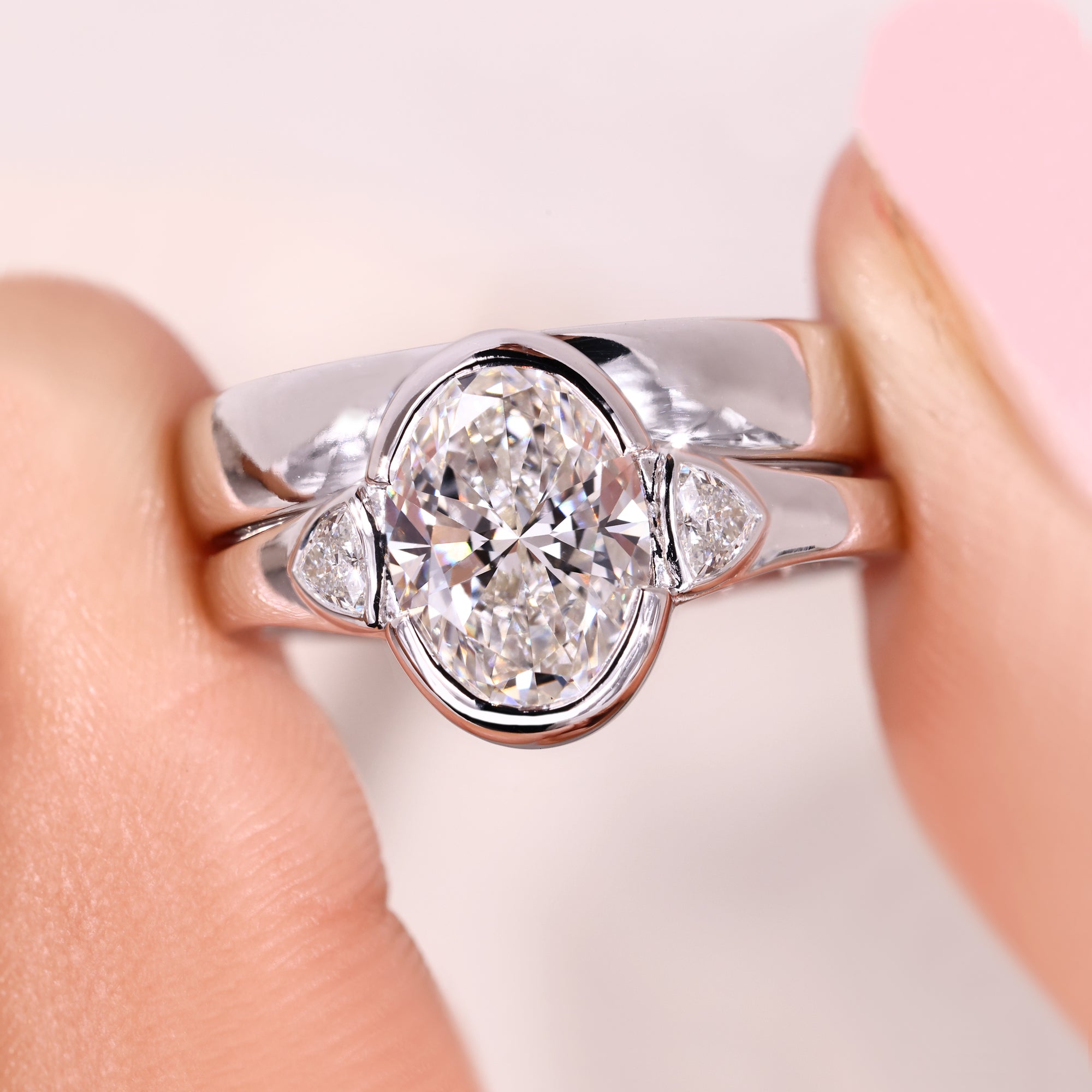 Lab grown diamond engagement ring with wedding band.