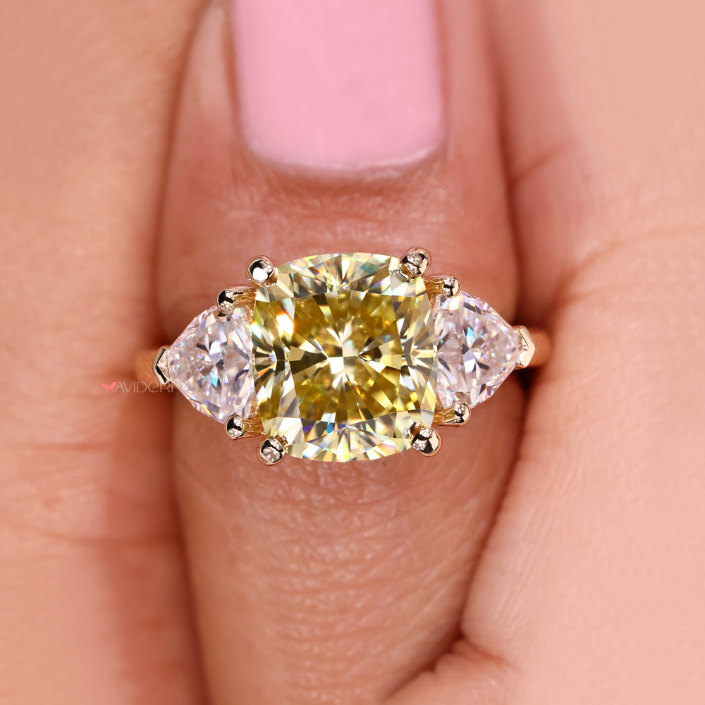 Two v prong cushion cut moissanite ring design.
