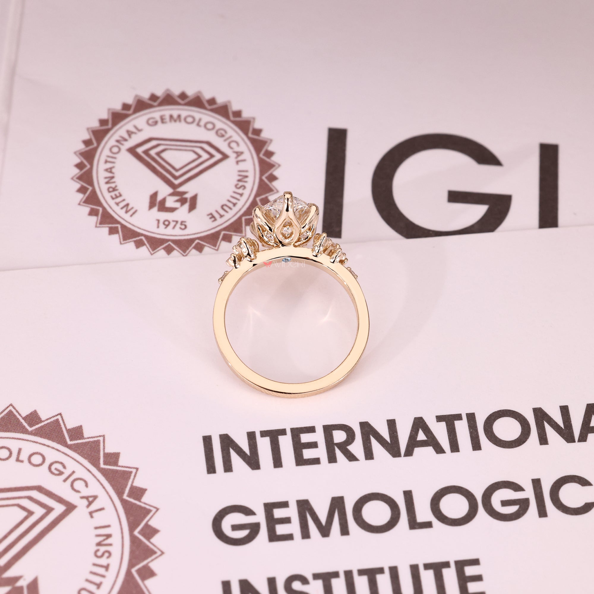 Tulip setting ring shaped for a soft and graceful look.