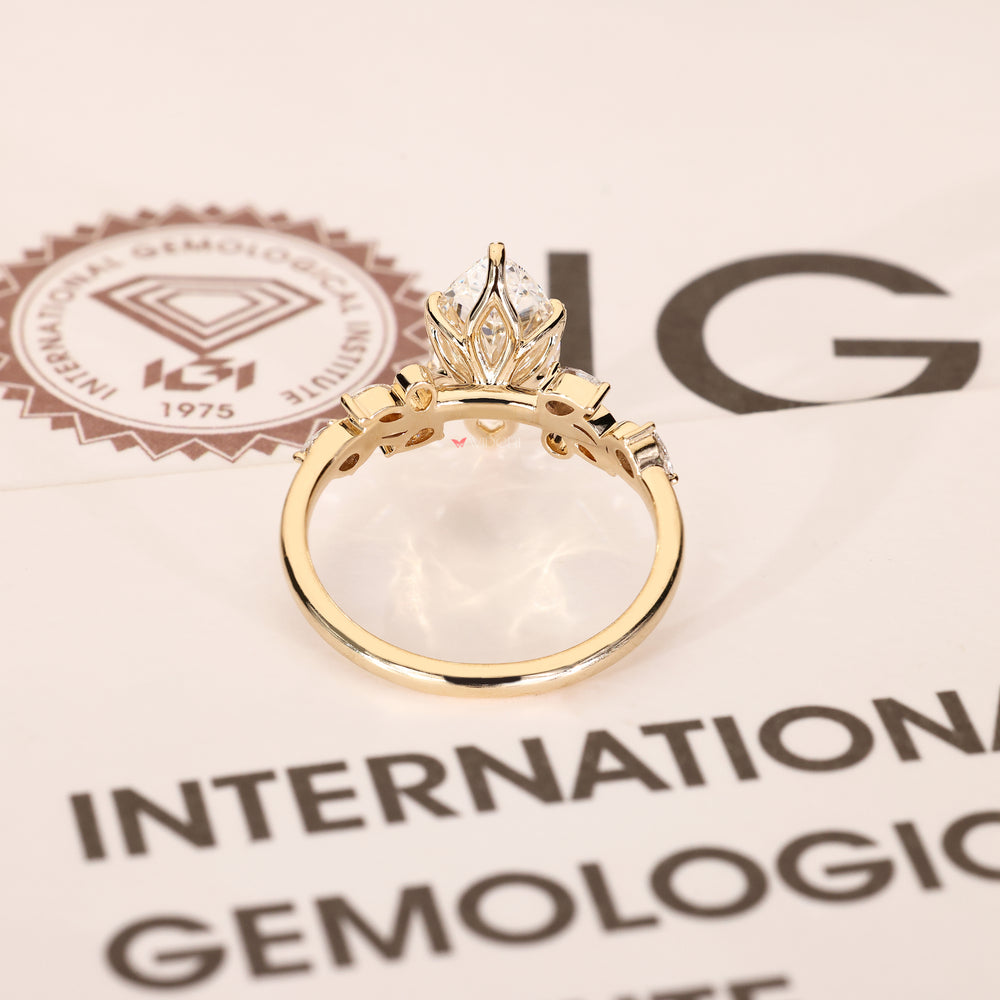 Handmade nature inspired ring with marquise center diamond design
