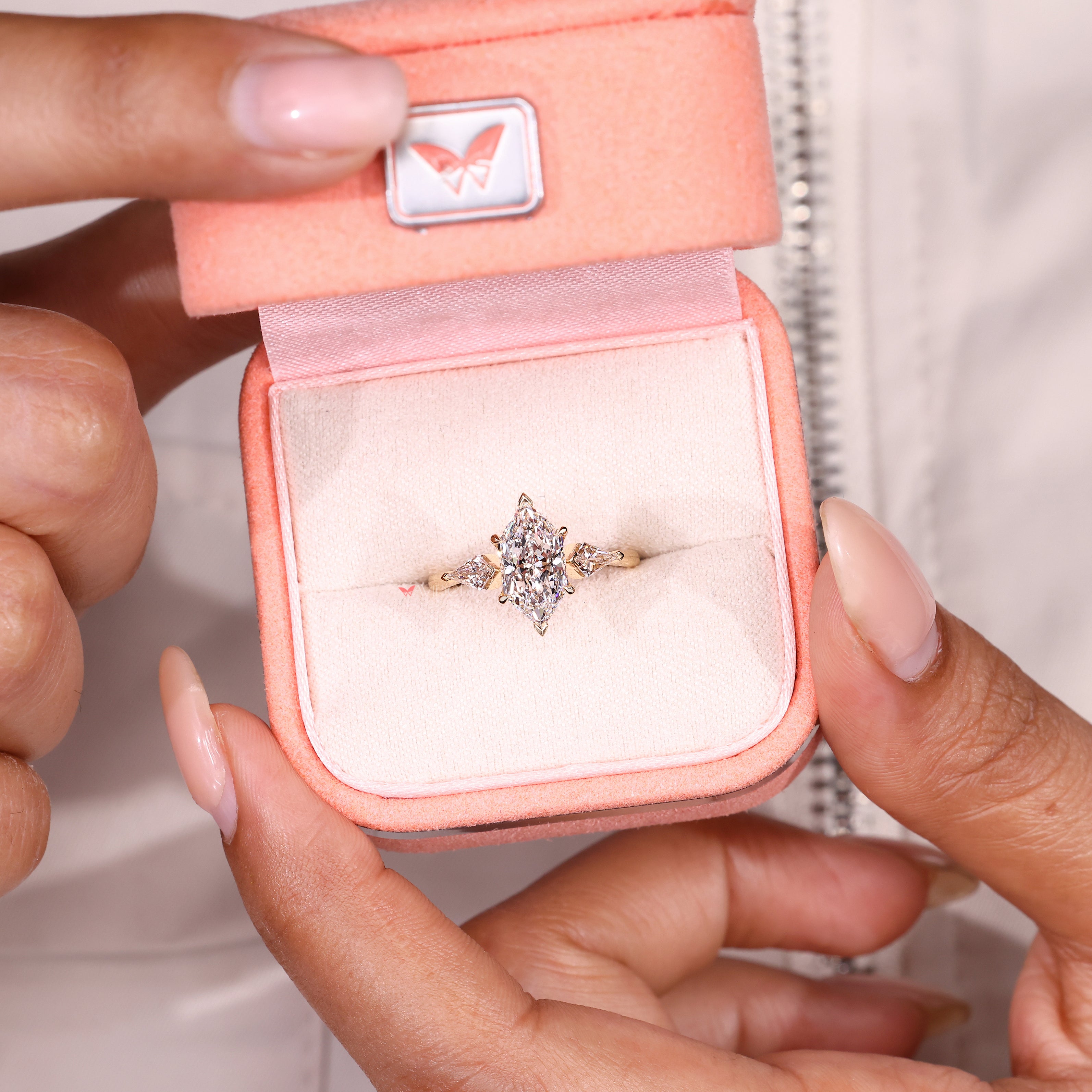 IGI certified marquise ring with tulip and claw setting
