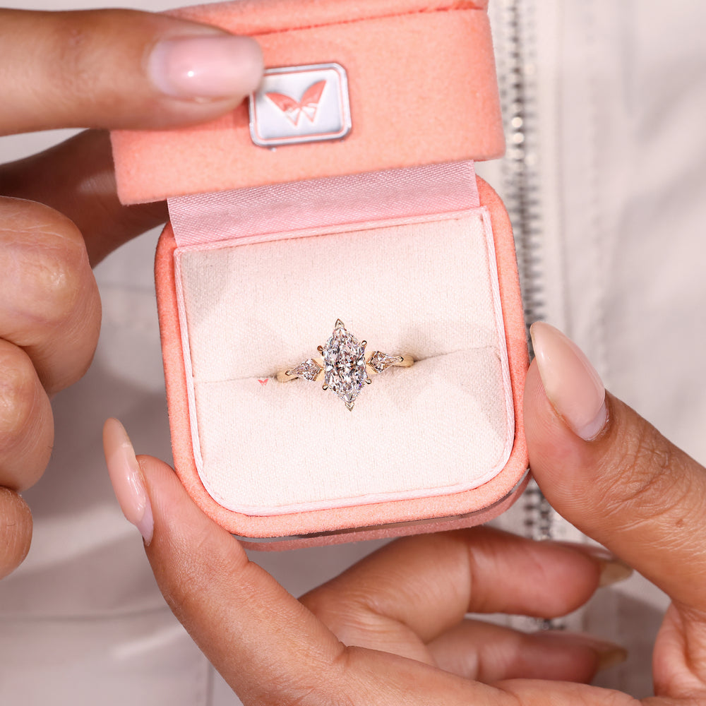 IGI certified marquise ring with tulip and claw setting
