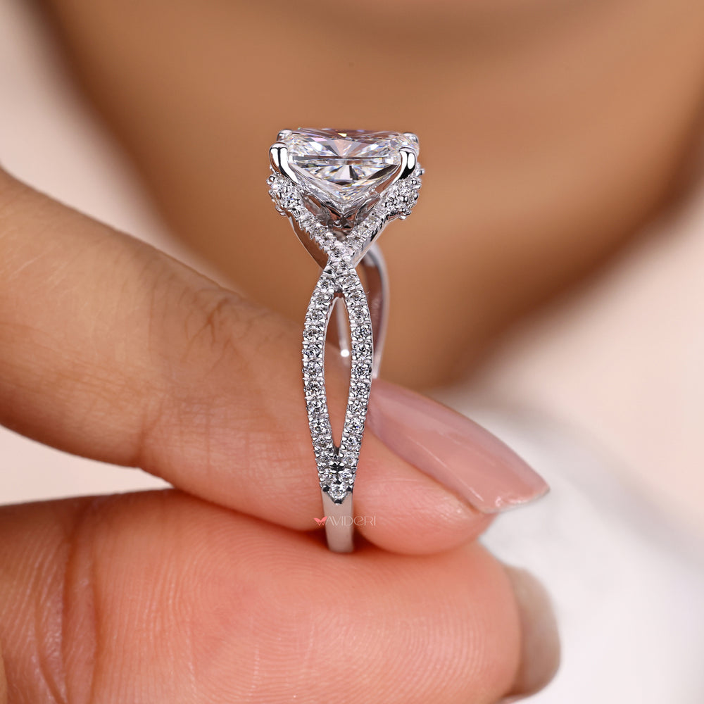 Twisted pave engagement ring showcasing a round prong setting, crafted with precision for added sparkle and beauty.
