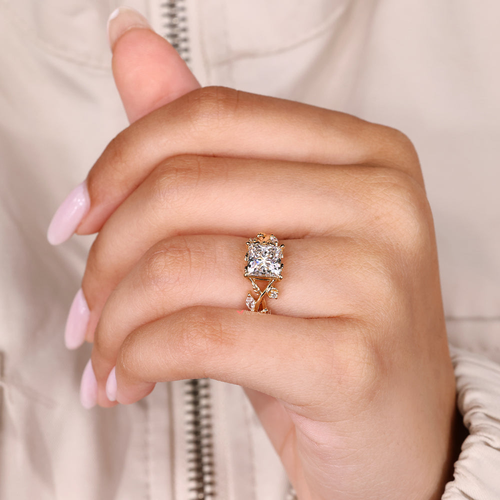 Princess ring with cathedral setting and prongs.

