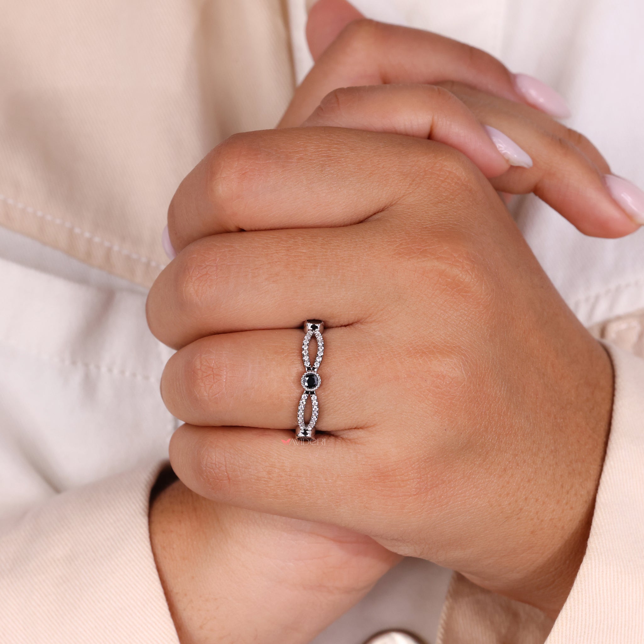 White gold band featuring an infinity wedding band design for elegance.