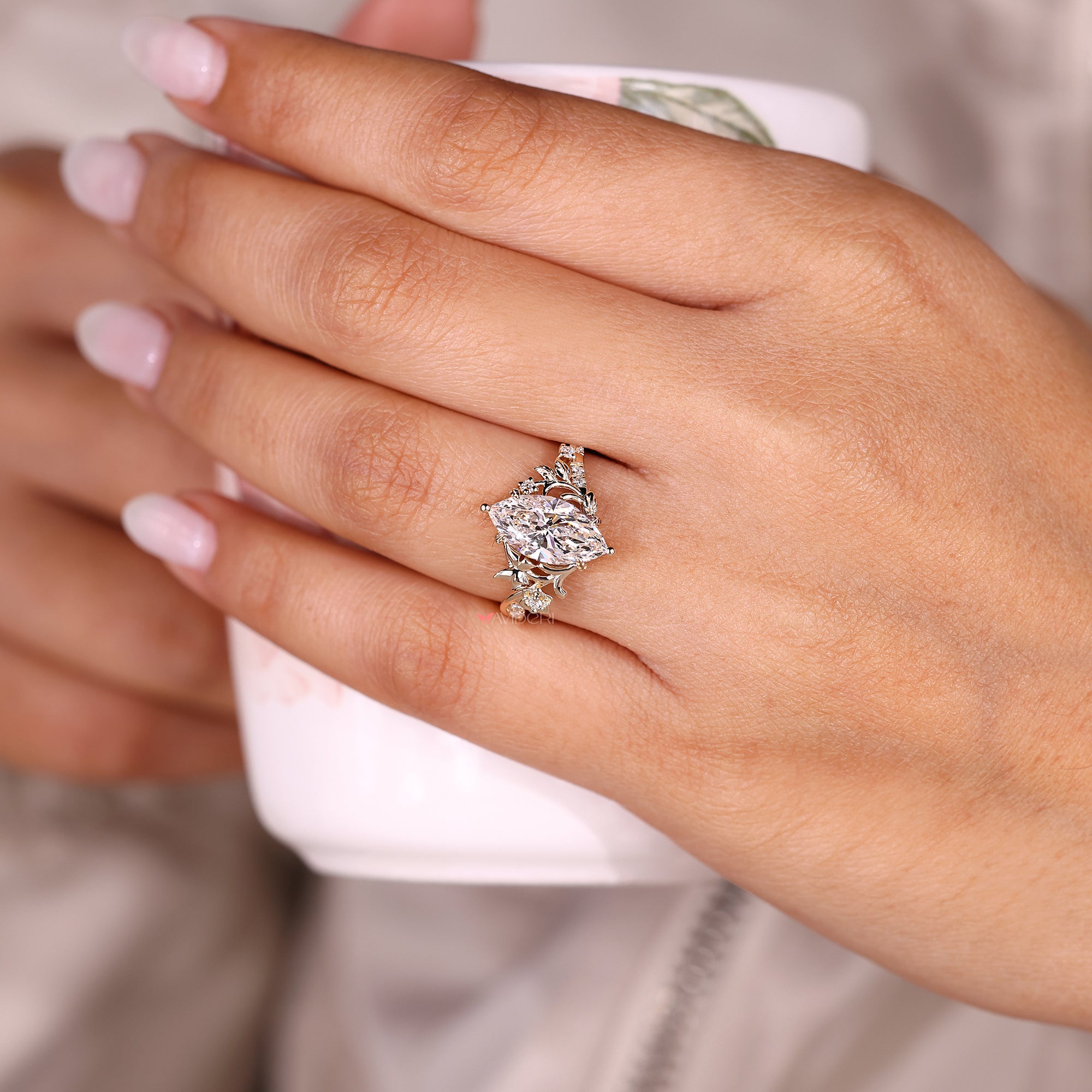 Nature inspired marquise diamond engagement ring.
