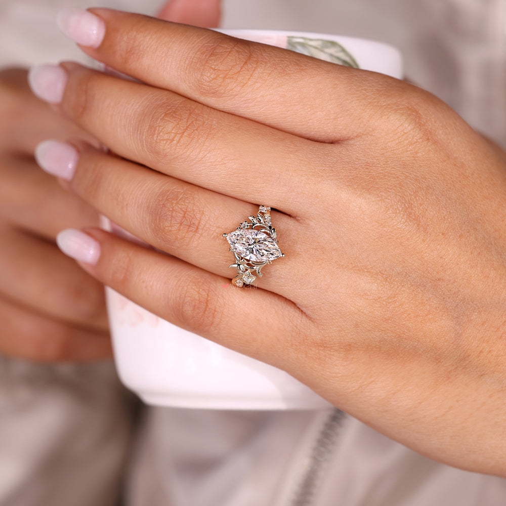 Nature inspired marquise diamond engagement ring.
