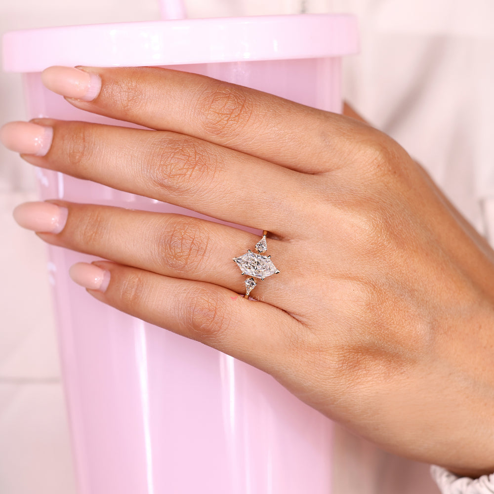 Three stone Dutch marquise ring with tulip setting details
