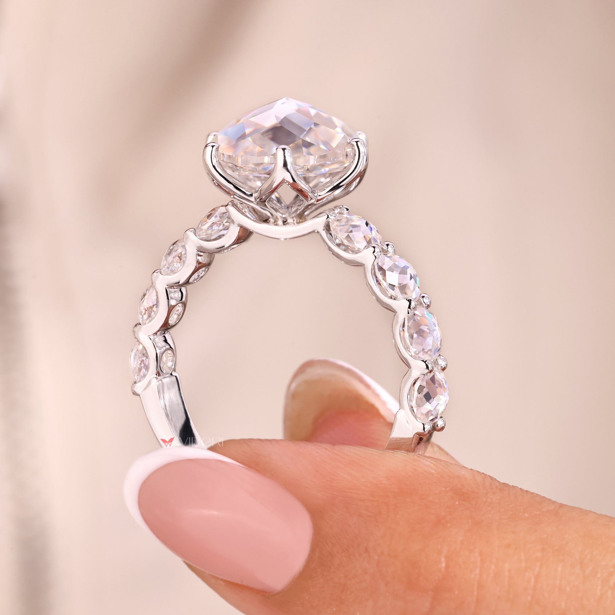 Tulip setting engagement ring with six prong design.