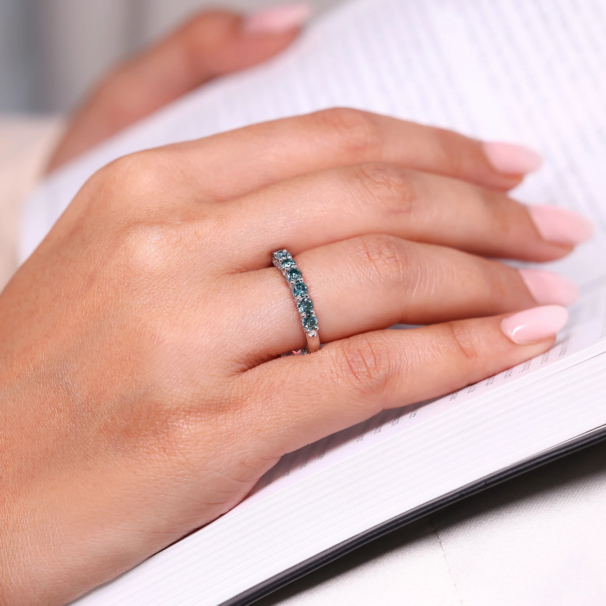 Tapered shank band with white gold wedding band.
