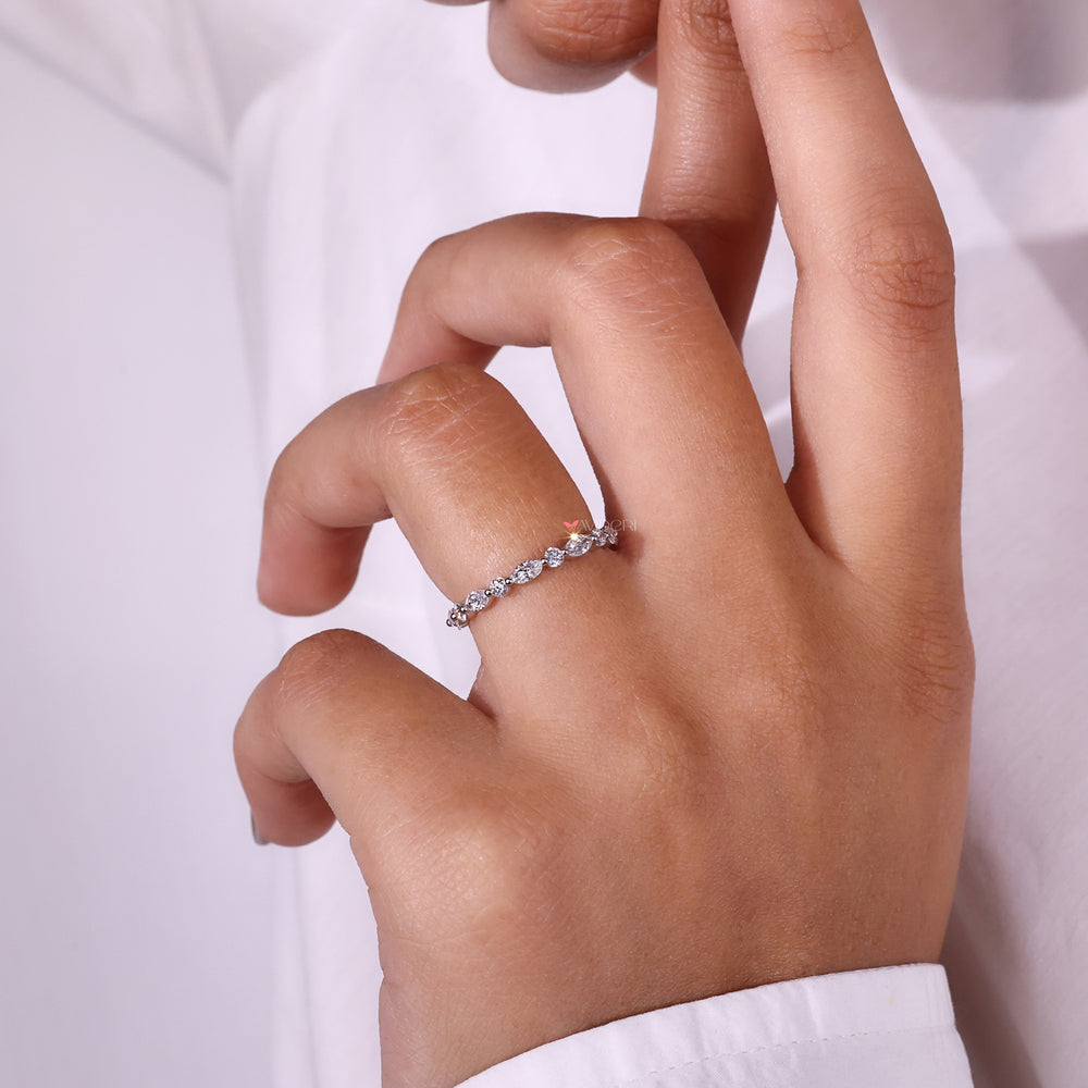 Timeless eternity wedding band with diamonds encircling the entire band.
