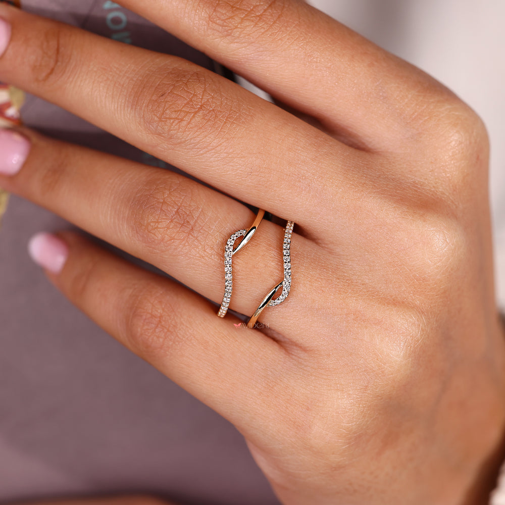 Diamond wedding band with a wrap guard style.