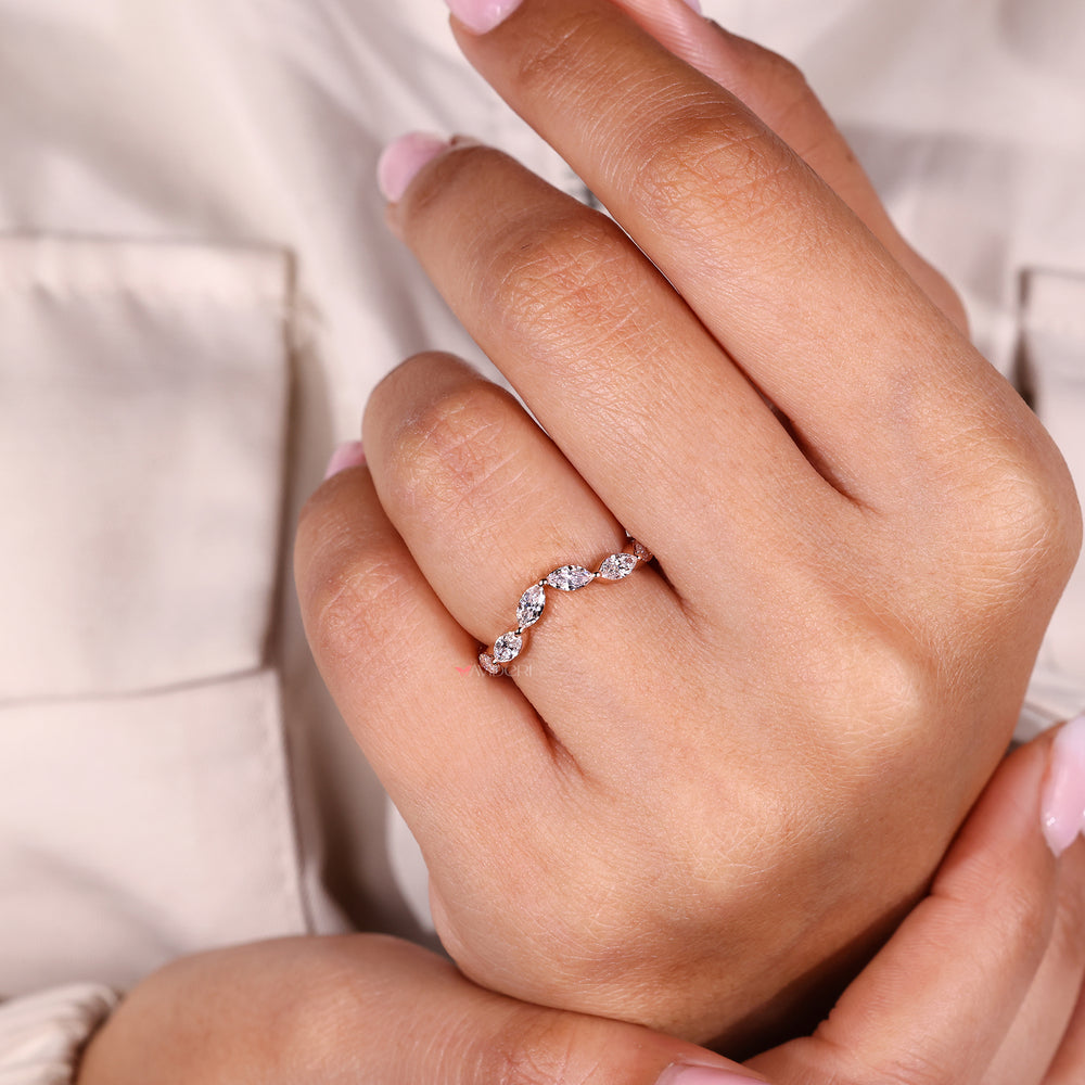 Unique wedding band with marquise diamonds.
